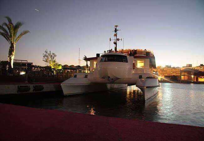 Group enjoying a catamaran party in Valencia Marina
